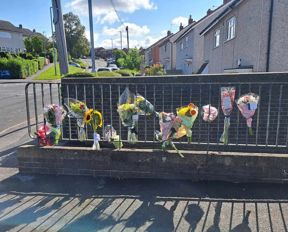 \u200bFloral tributes left the scene he scene in Wortley, Leeds, following the death of parcel delivery driver Claudiu-Carol Kondor