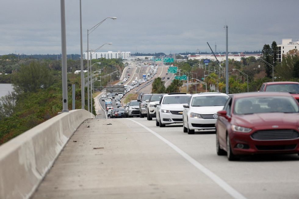 u200bFloridians flee ahead of storm