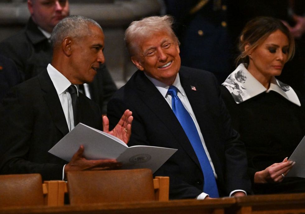 \u200bFormer President Barack Obama and President-elect Donald Trump speak ahead of the state funeral services for former President Jimmy Carter