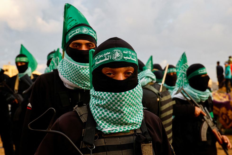 u200bHamas militants keep guard on the day Hamas hands over deceased hostages