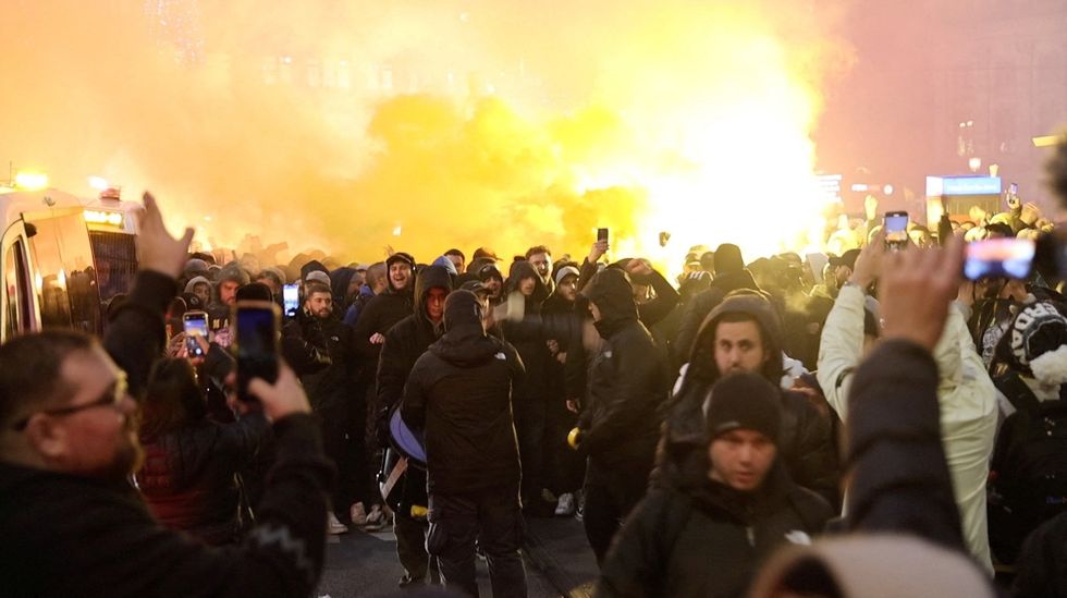 u200bIsraeli Maccabi Tel Aviv supporters demonstrate and light flares in Amsterdam, Netherlands