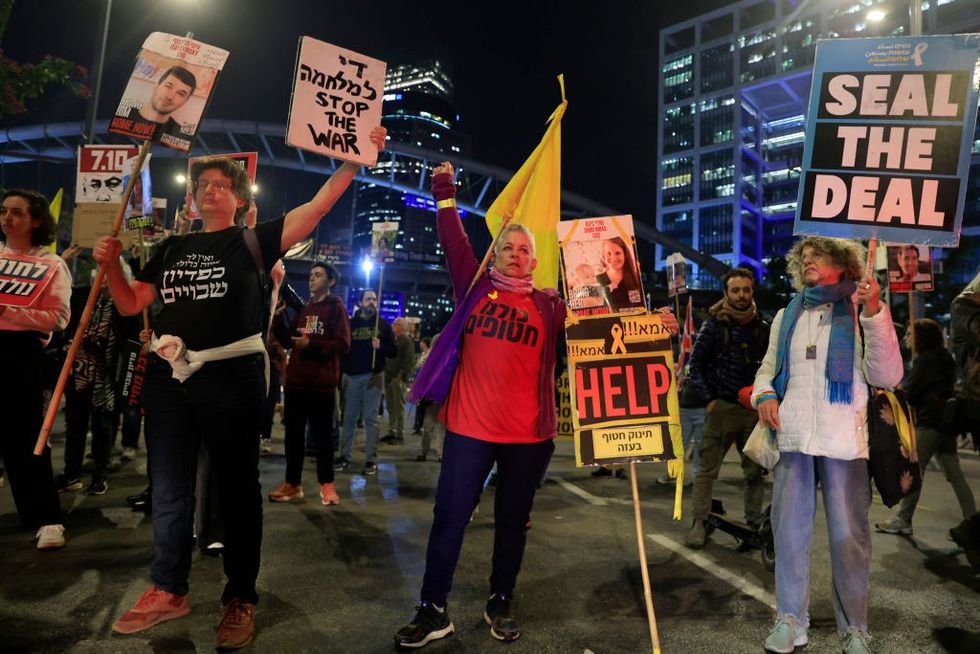 \u200bIsraelis in Tel Aviv react to the reports of a possible Gaza cease fire and hostage release deal