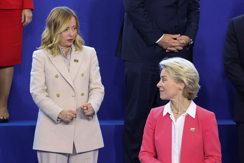 u200bItaly's Prime Minister Giorgia Meloni gestures next to European Commission President Ursula von der Leyen