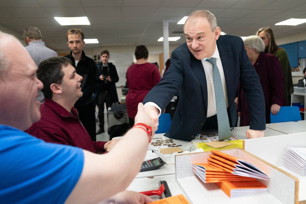 \u200bLiberal Democrat leader Sir Ed Davey meets workers at the Burwell Print Centre near Cambridge