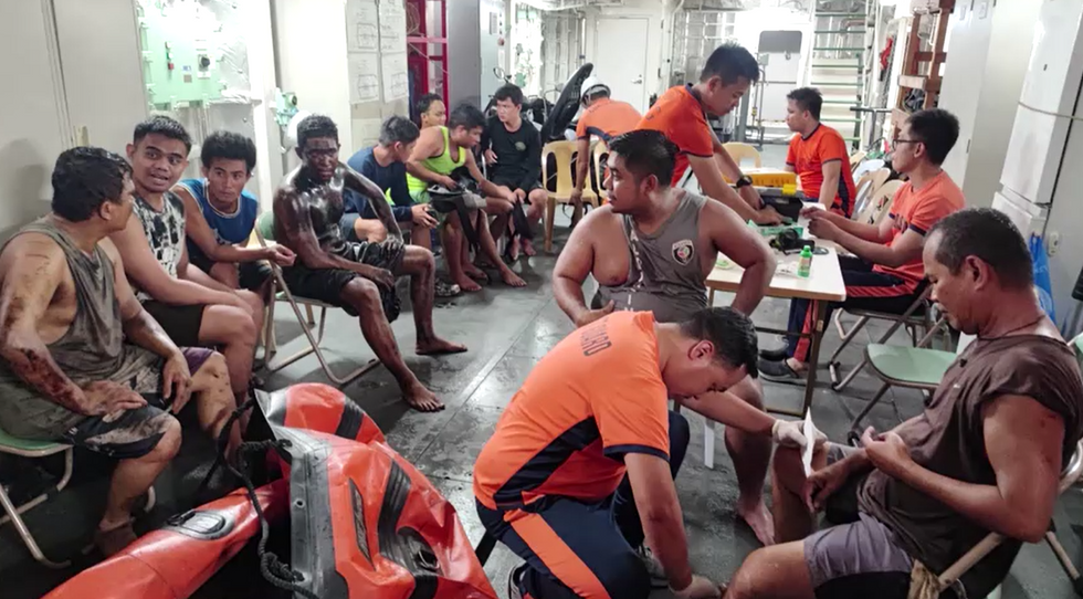 \u200bMembers of the crew after being rescued from the oil tanker