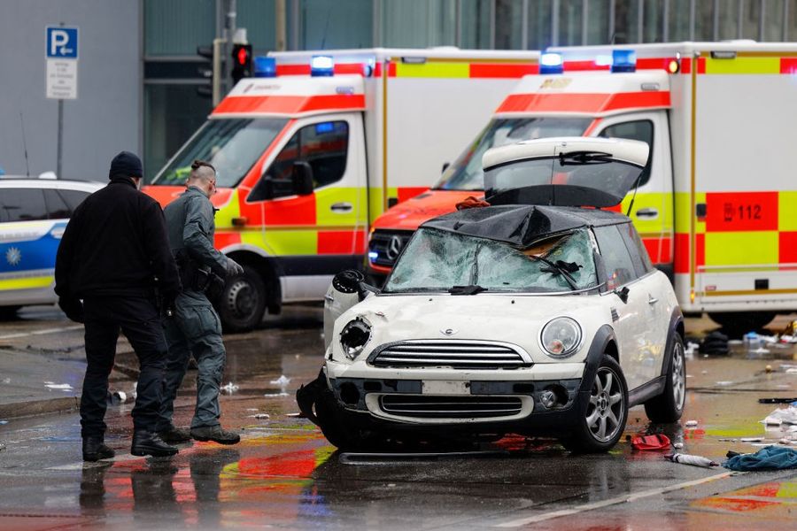 \u200bMembers of the emergengy services work at the scene where a car drove into a crowd in the southern German city of Munich