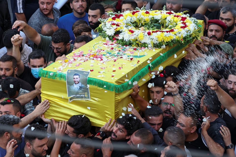 u200bMen carry the coffin of Abbas Fadel Yassin, who was killed amid the detonation of pagers across Lebanon, during his funeral in Beirut