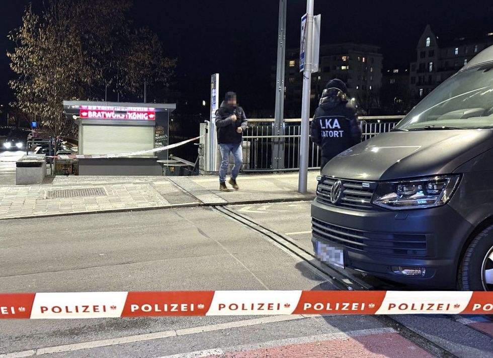 u200bOfficers of the Austrian State Criminal Police are seen near a police cordon