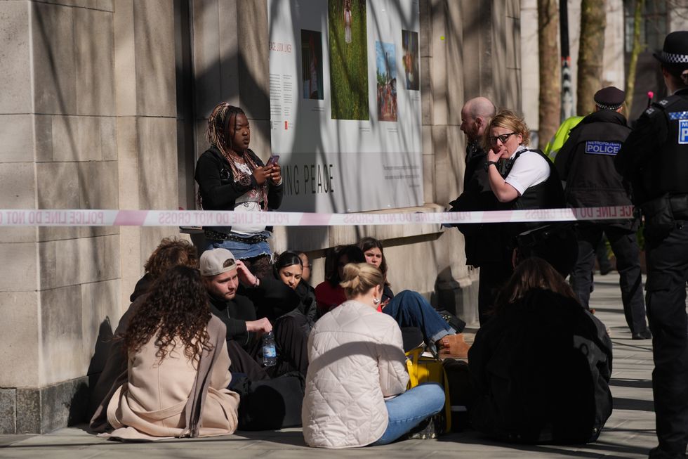 u200bPeople at the scene of an incident involving a van in The Strand, central London