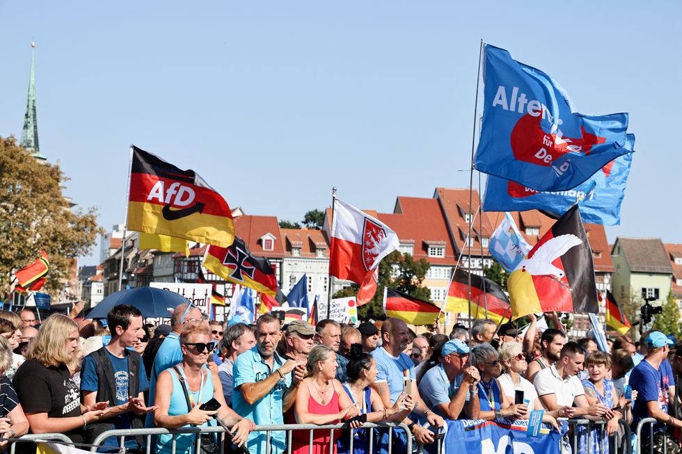 \u200bPeople attend an election campaign rally for the Thuringia state elections