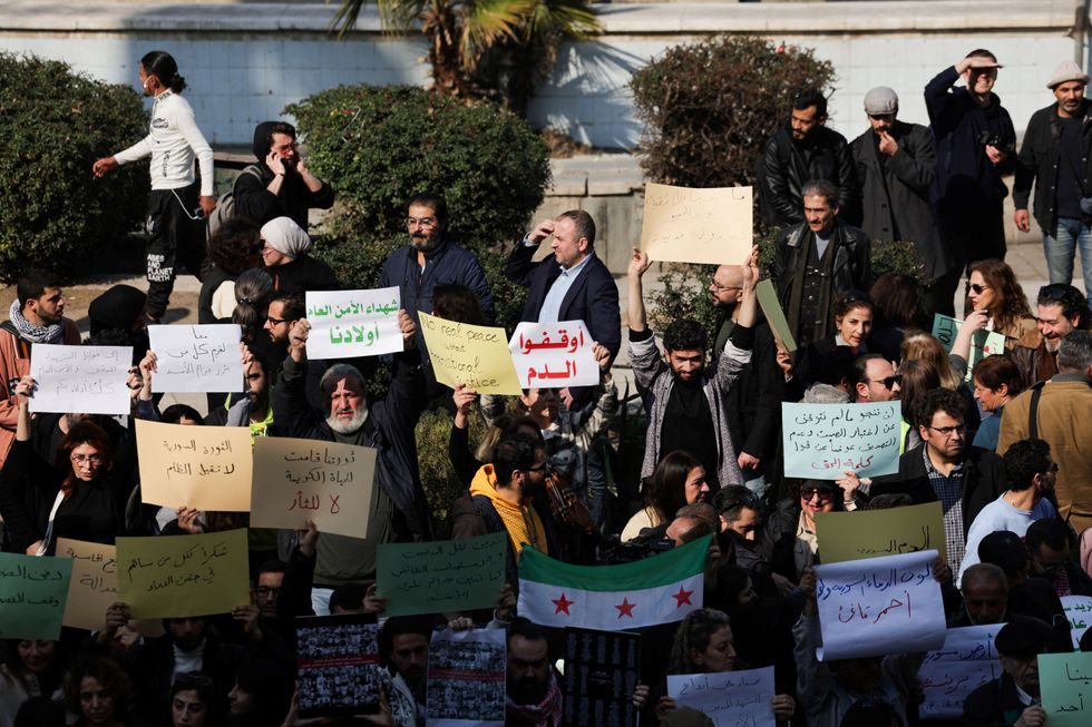 \u200bPeople protest against the killing of civilians and security forces linked to Syria's new rulers