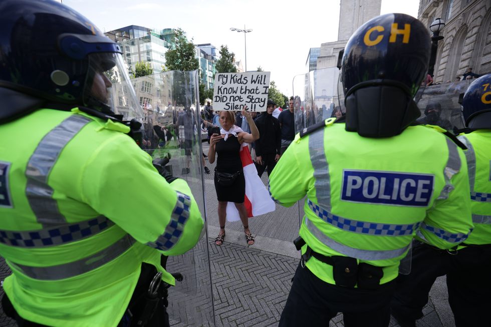 u200bPeople protest in Liverpool, following the stabbing attacks on Monday in Southport