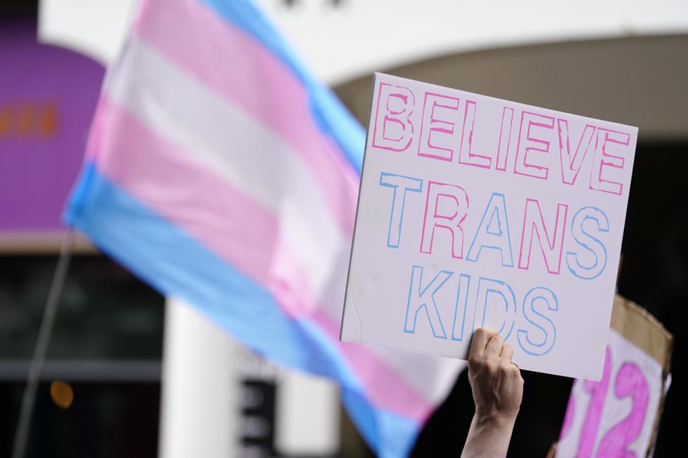 \u200bPeople take part in a Trans Pride protest march in Brighton