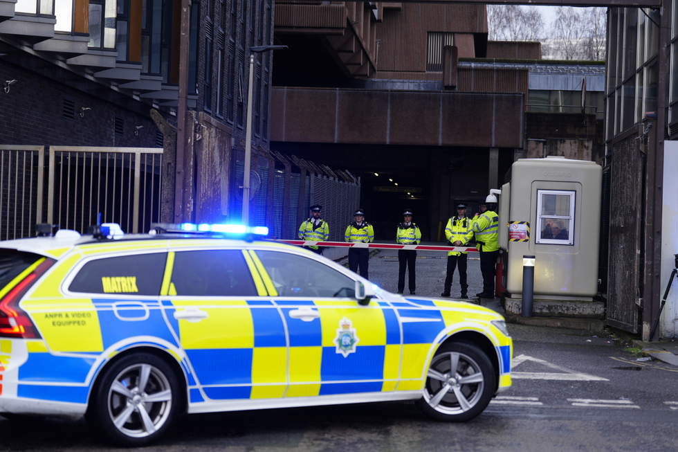 \u200bPolice escort a prison van believed to contain Axel Rudakubana arriving at Liverpool Crown Court