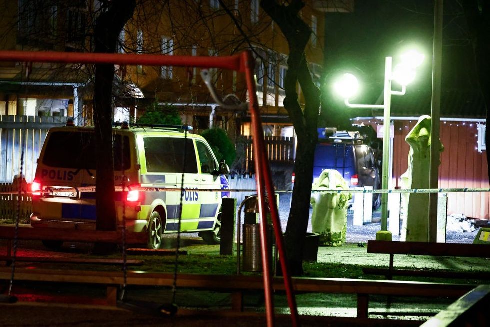 u200bPolice is seen at a crime scene in an apartment block in Soedertaelje