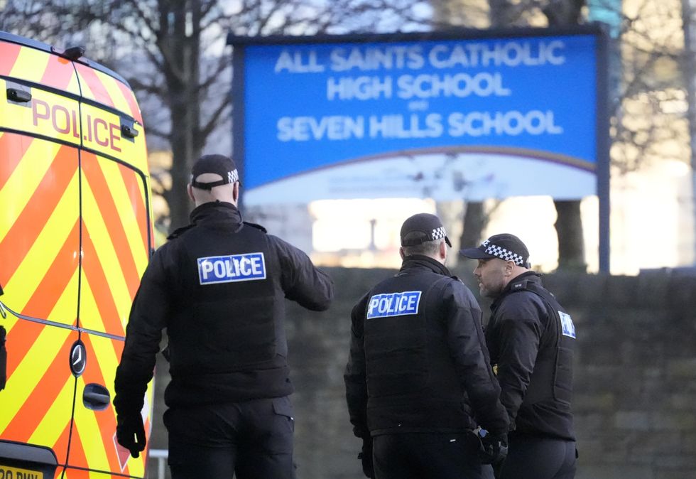 \u200bPolice officers outside All Saints Catholic High School