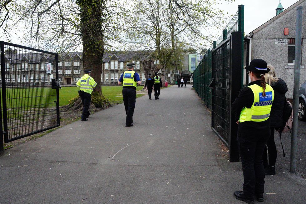 u200bPolice officers outside Amman Valley school, in Ammanford, Carmarthenshire