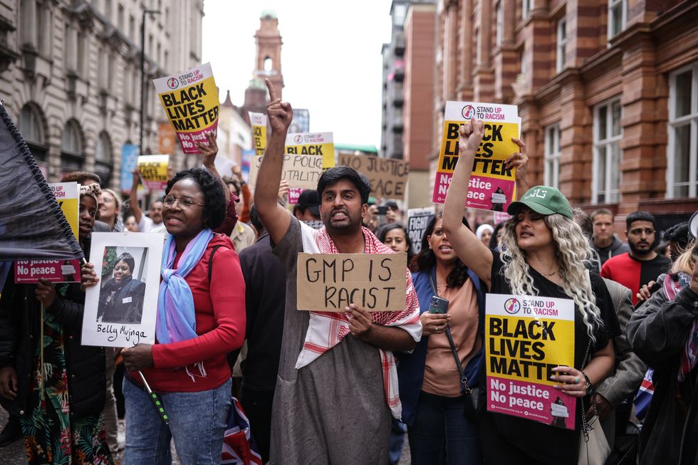 u200bProtesters held up signs saying 'Black Lives Matter'