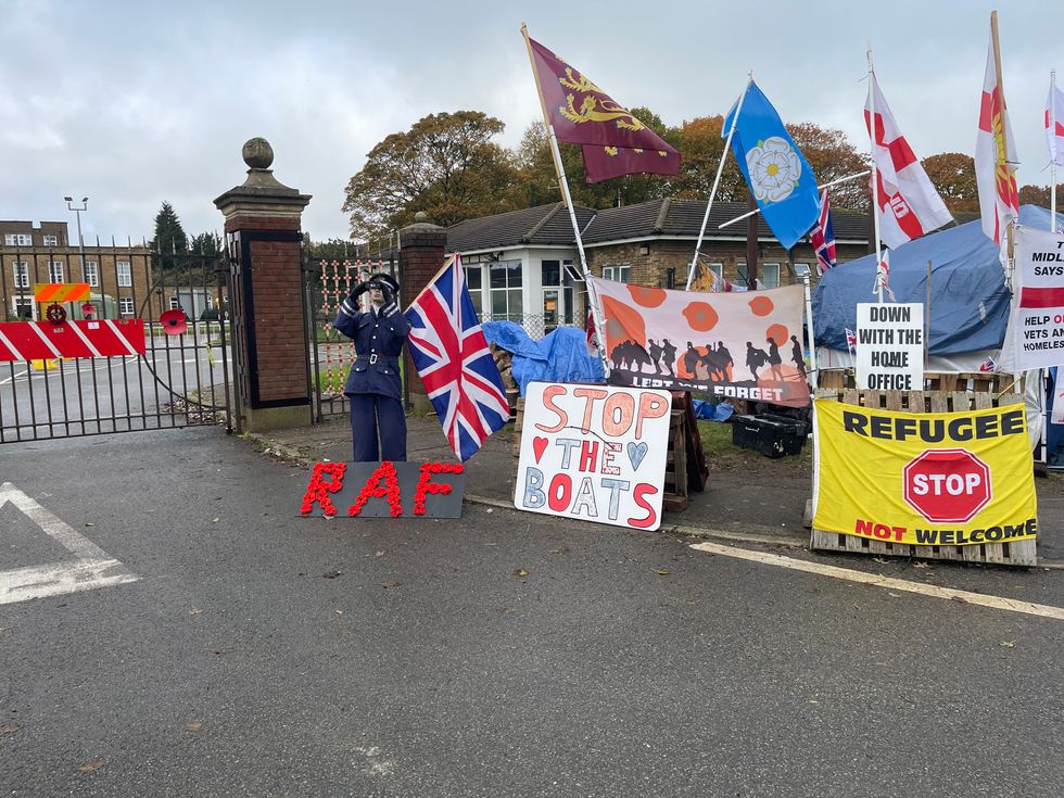 RAF Scampton: Protestors burn Dambusters flag in shocking scenes as ...