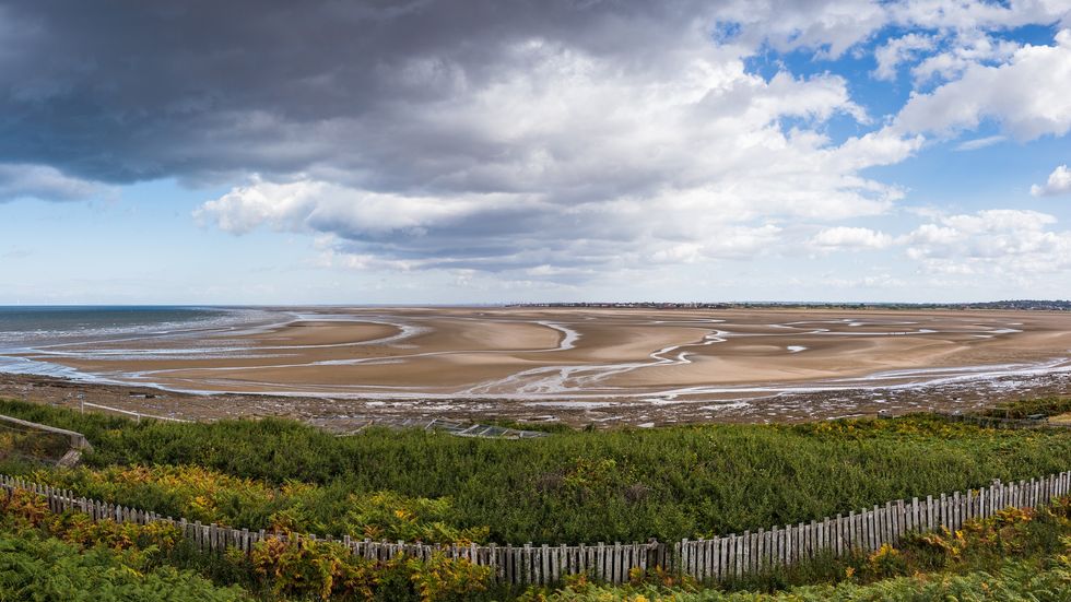 u200bRhe beach at Holylake, seen from Hilbre Island in the Dee Estuary.