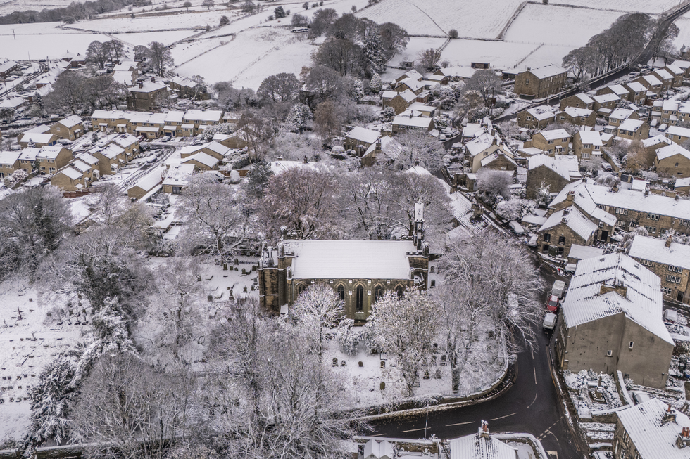 u200bSnow surrounds All Saints Netherthong Church in Holmfirth west Yorkshire.