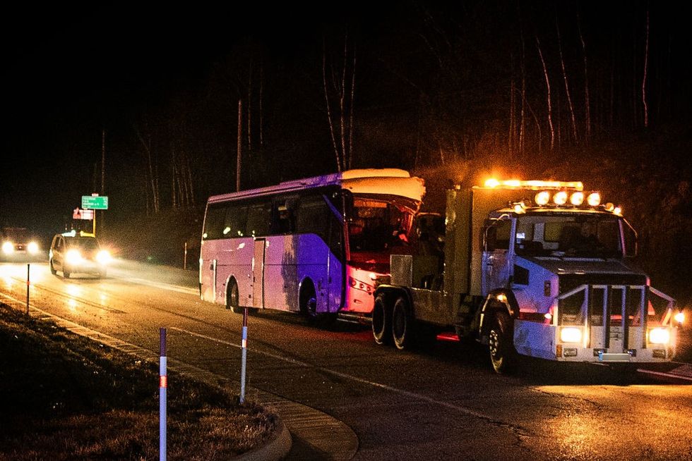 u200bThe damaged bus being towed away