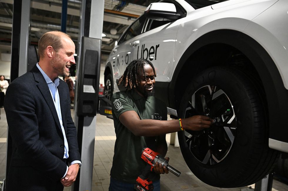 u200bThe Prince of Wales speaking to a worker during a visit to the 2023 Earthshot Prize Finalist, ENSO, in Brentford