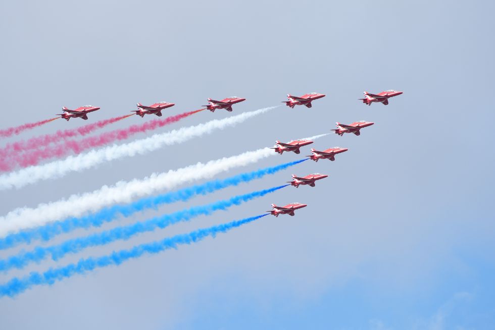 u200bThe Red Arrows display team perform a fly past over the Farnborough International Airshow