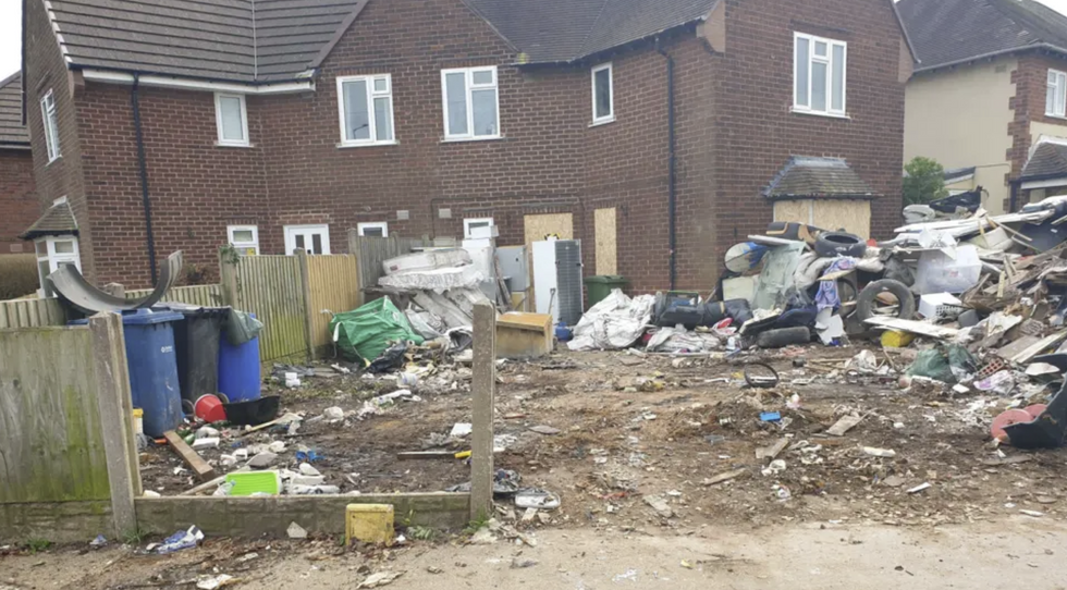 u200bThe rubbish was piled high outside the Stafford property