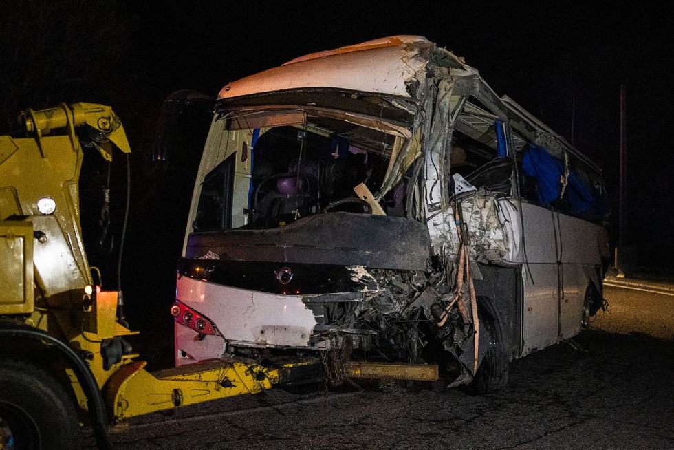 u200bThe Spanish damaged bus towed by a truck in Porte-Puymorens, southern France