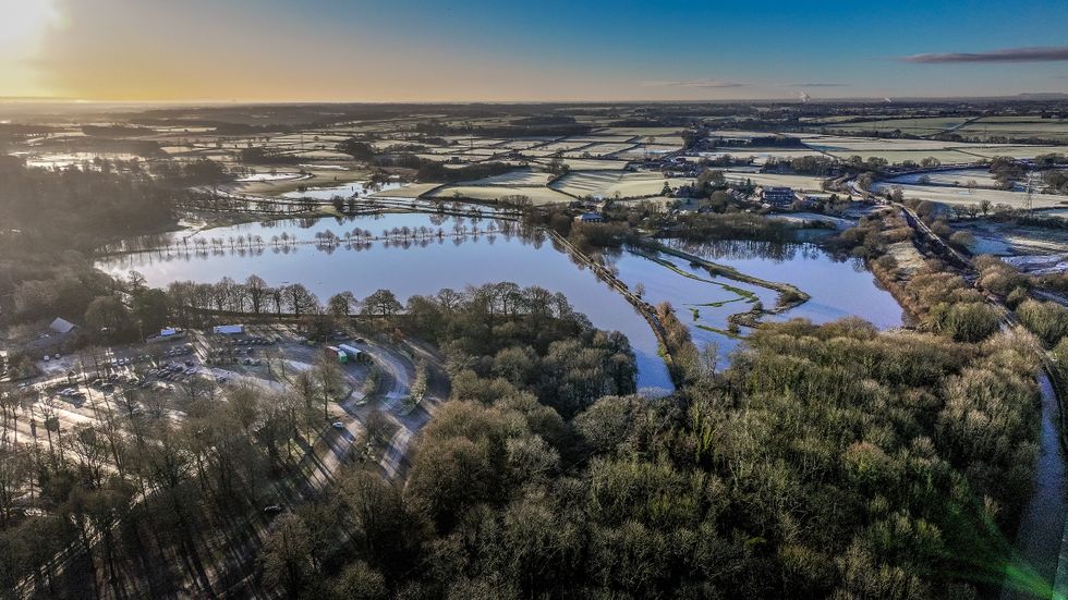 \u200bThe view after the Bridgewater Canal embankment collapsed during heavy rain near Little Bollington, Lancashire