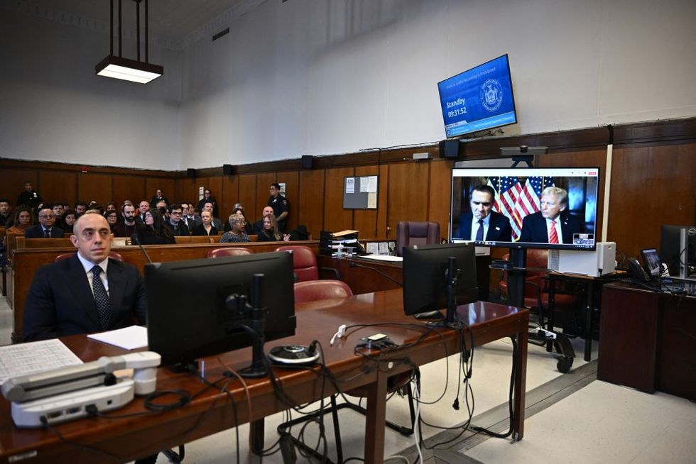 u200bTrump attorney Emil Bove looks on as US President-elect Donald Trump appears remotely for a sentencing hearing