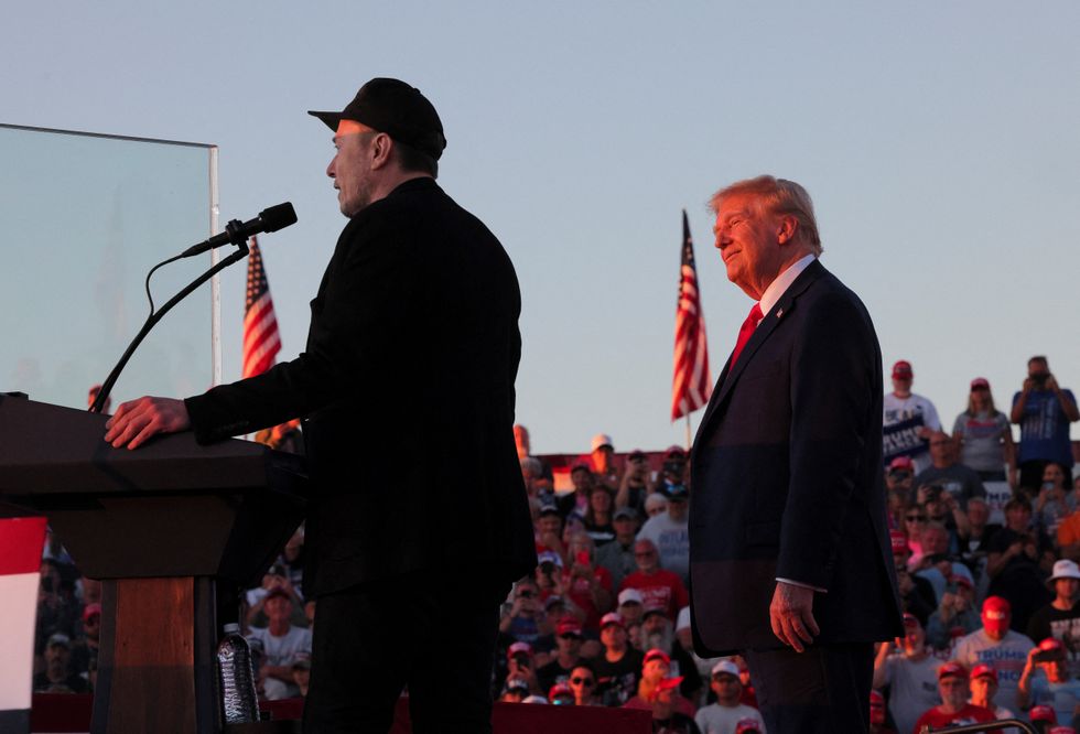 u200bTrump watches as Tesla CEO Elon Musk speaks