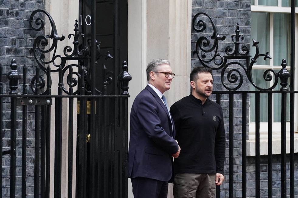 \u200bUkrainian President Volodymyr Zelensky is greeted by Prime Minister Sir Keir Starmer