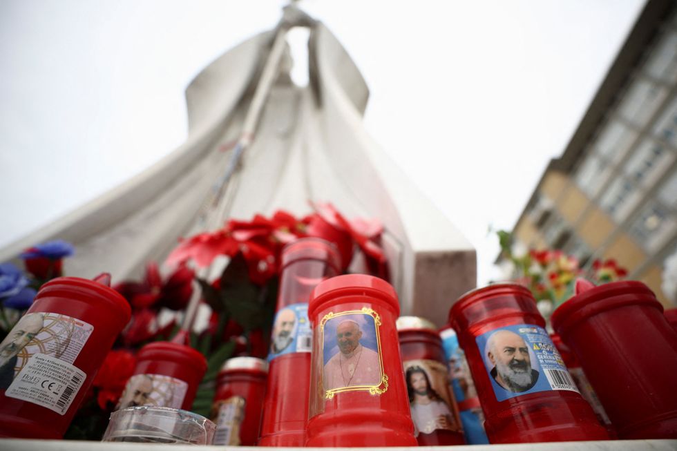 u200bWell-wishers lit candles outside the hospital