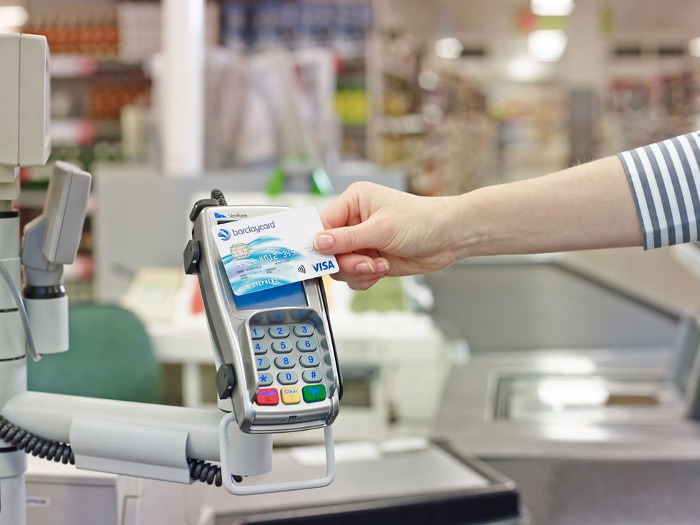 Undated handout photo issued by Barclaycard of a Visa card being used to make a contactless payment