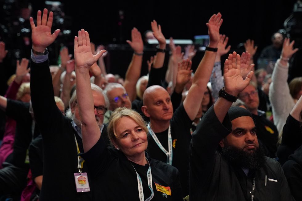 Unite general secretary Sharon Graham (front left) votes with other delegates in favour of a motion calling for the winter fuel cut to be reversed