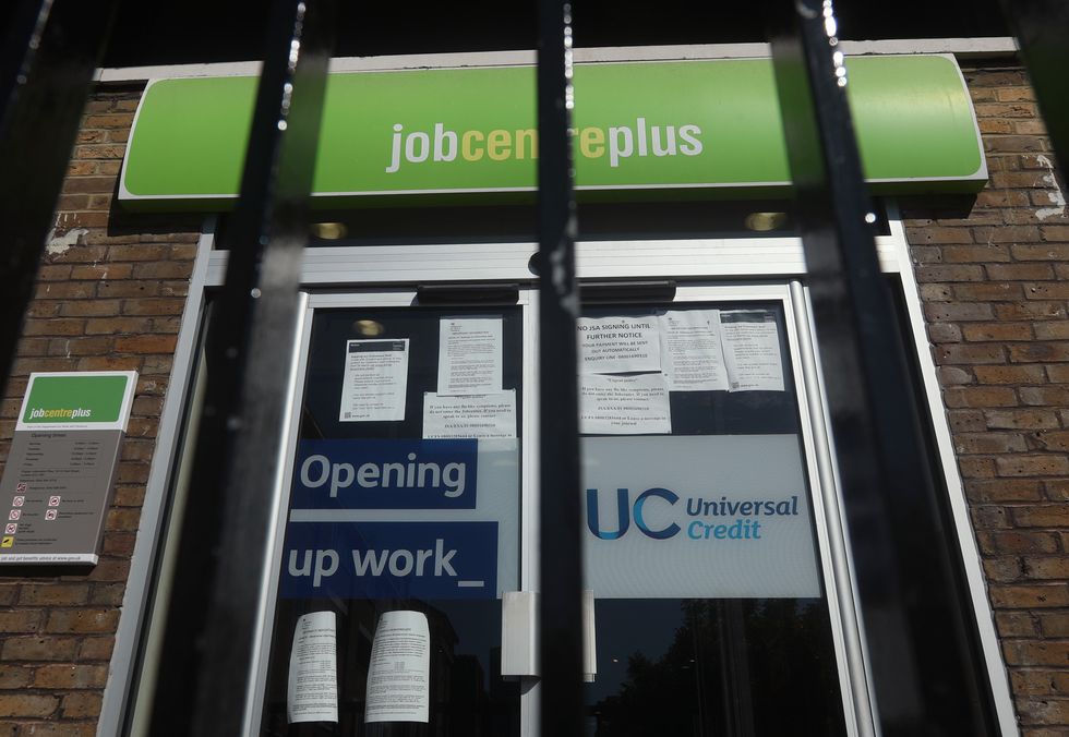 Universal Credit sign at a Jobcentre Plus in pictures