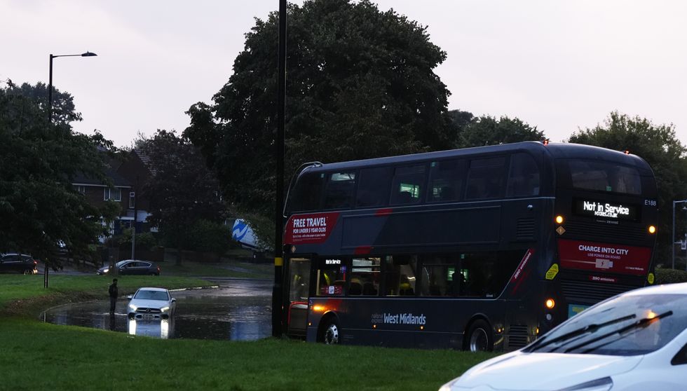 Vehicles stranded in flood water on Aldridge Road in Perry Bar, Birminghamu200b