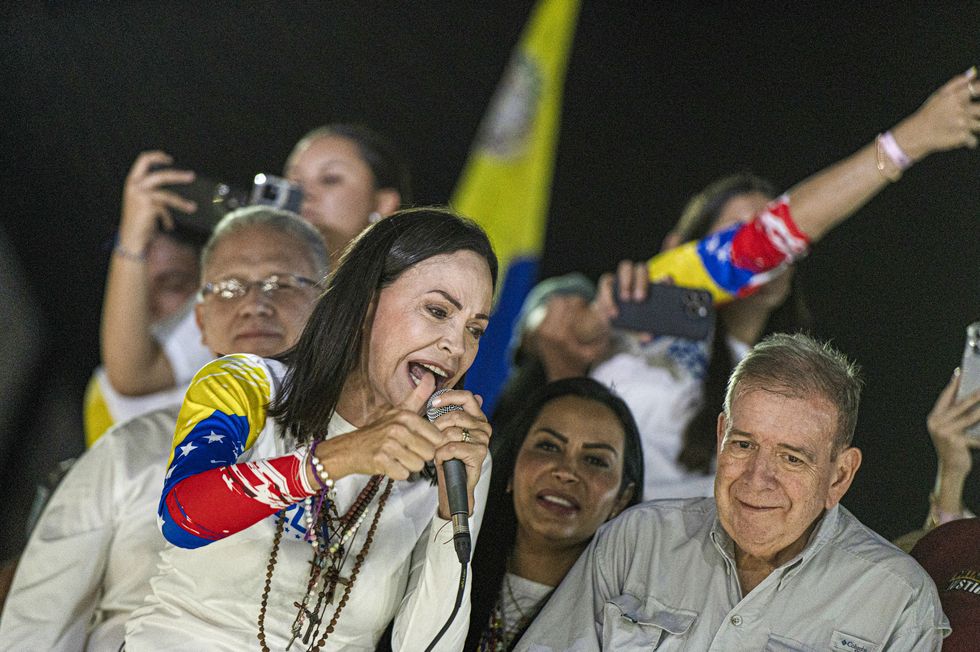 Venezuelan opposition presidential candidate Edmundo Gonzalez and opposition leader Maria Corina Machado greet thousands of supporters