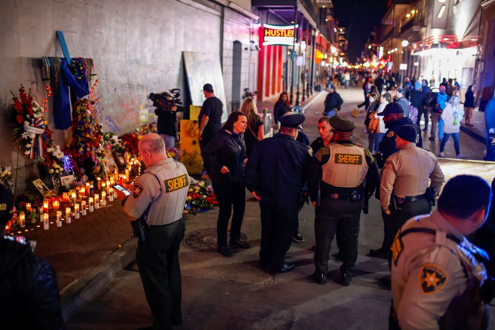 Vigils and memorials in New Orleans's French Quarter after the attack