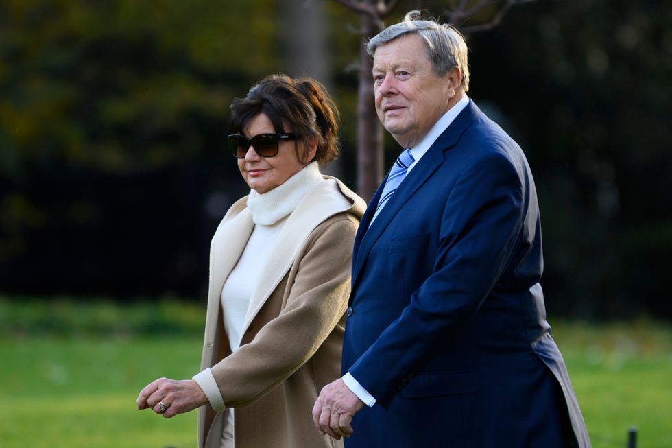 Viktor and Amalija Knavs depart the White House in Washington