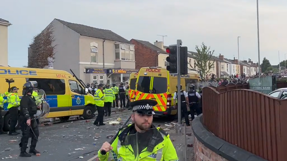 Southport: Police van on fire and officers 'suffer injuries' in clashes ...