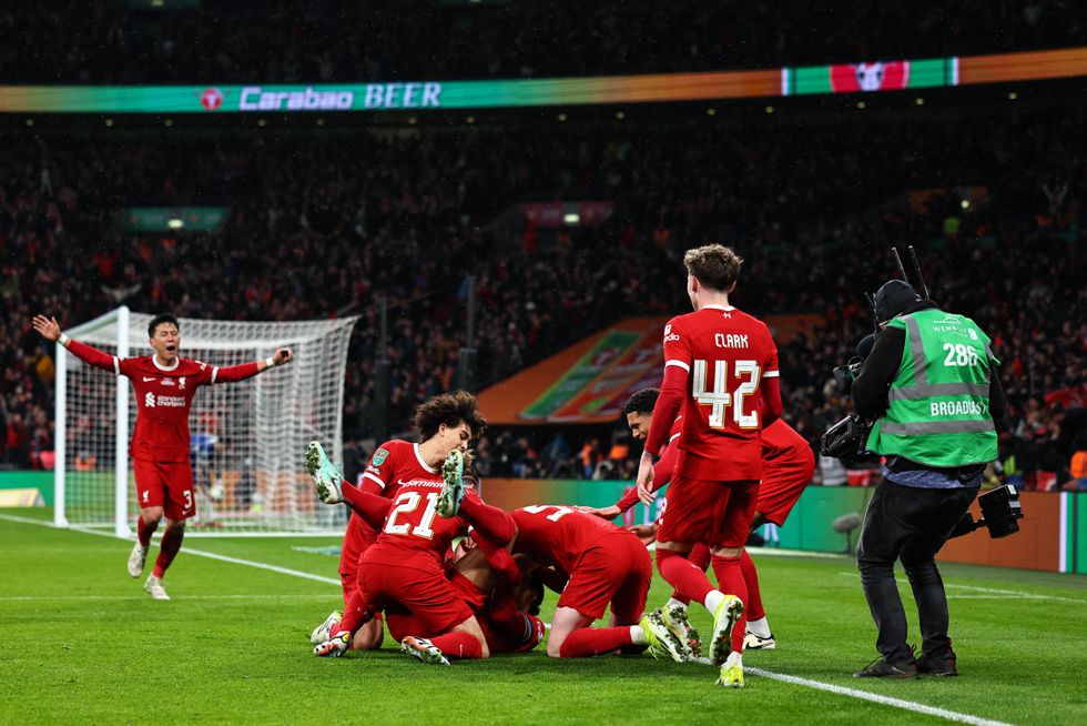 Jurgen Klopp lauds 'absolutely insane' Liverpool win as outgoing boss ...