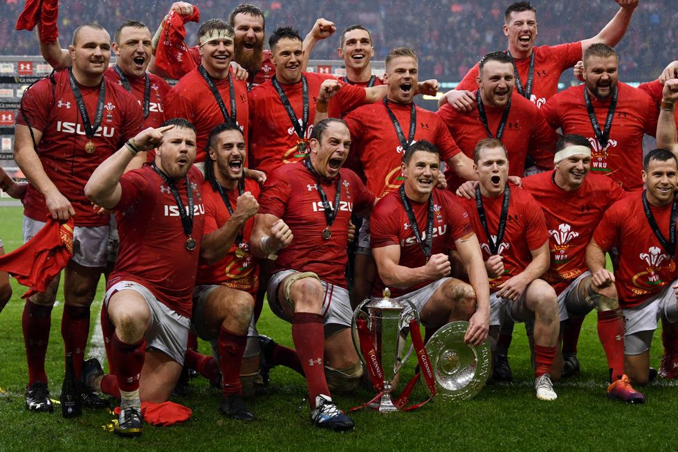 Wales players celebrate winning the Grand Slam in 2019