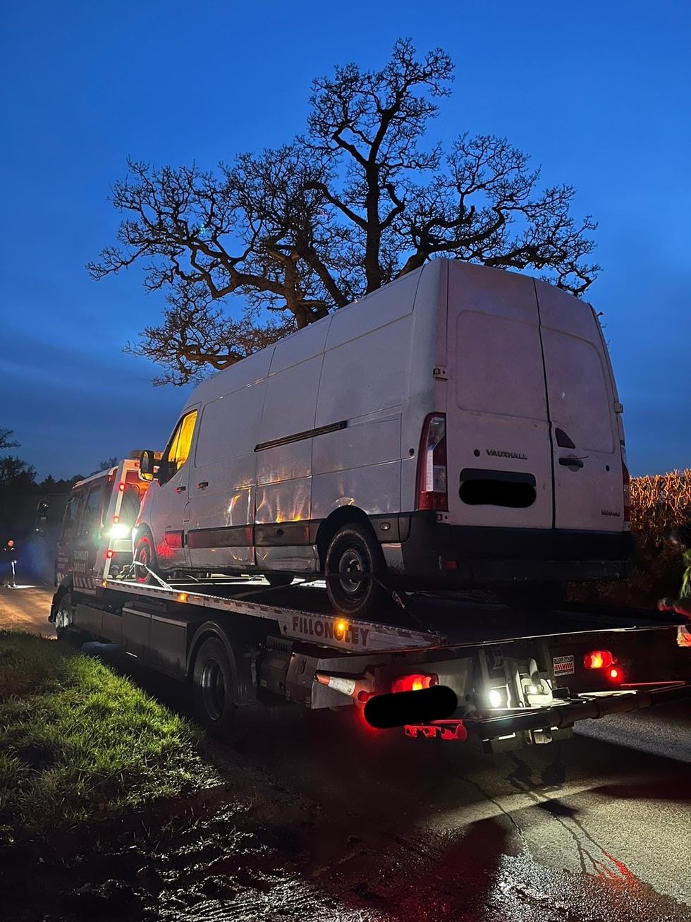 White van being taken away