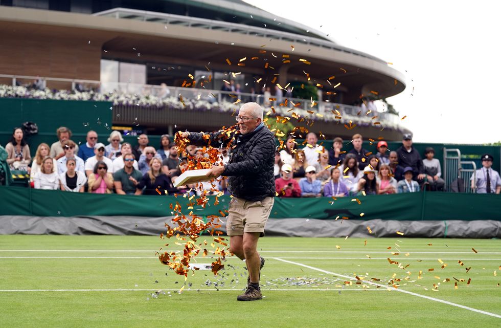 William Ward throwing confetti