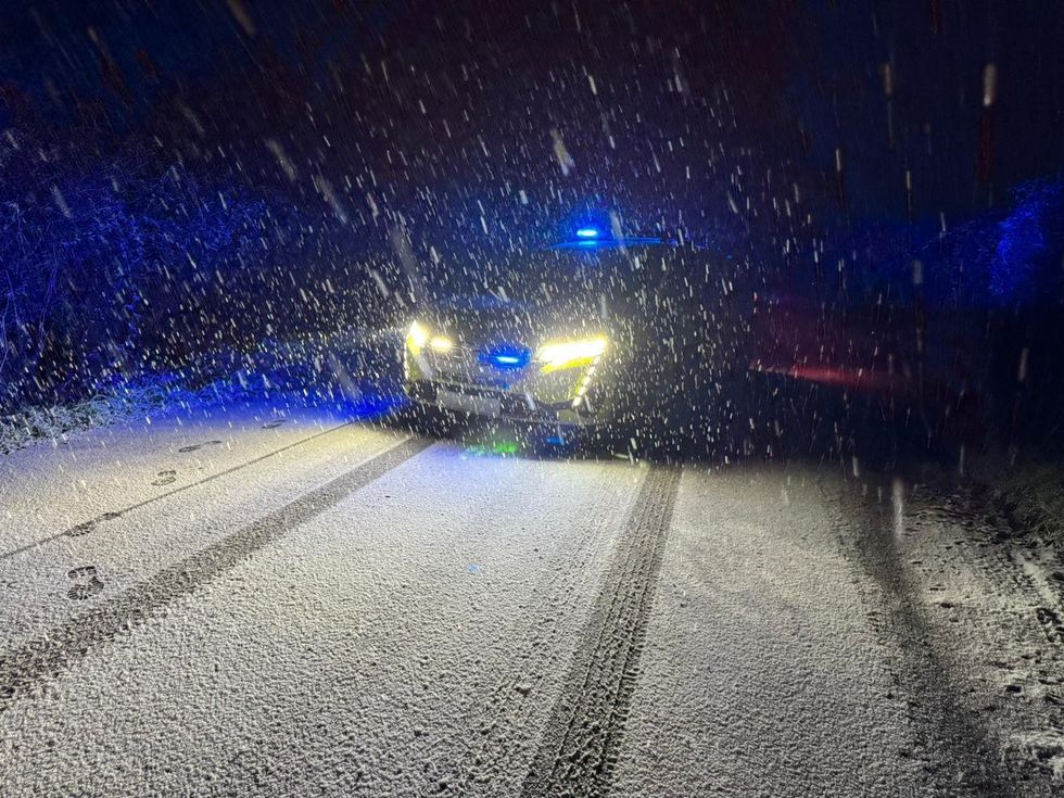 Wiltshire police car in heavy snow