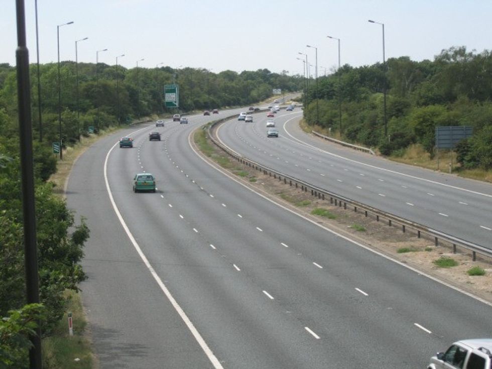 Winding motorway with cars