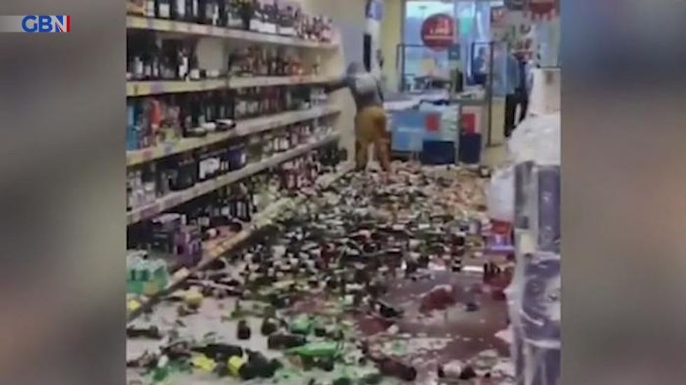 Woman who destroyed £10,000 worth of booze in Aldi glass-smashing rampage is fined thousands